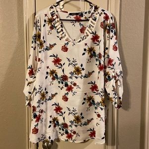 White flowery blouse